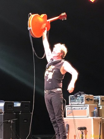 Brian Setzer Shoots he Scores Triumphant Jump.jpg